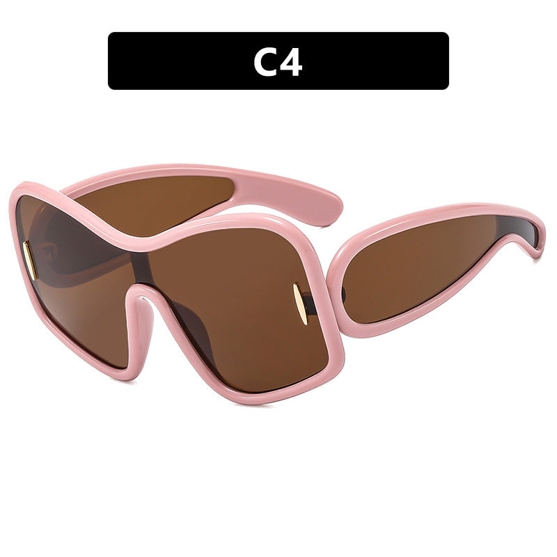 Schicke Sonnenbrille mit unregelmäßigem großem Rahmen